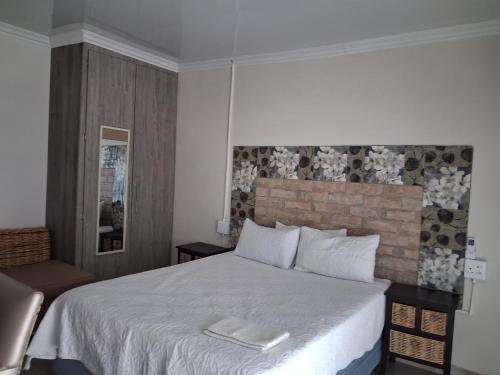 Postel nebo postele na pokoji v ubytování Khahliso Guesthouse