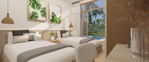 Ένα ή περισσότερα κρεβάτια σε δωμάτιο στο Sansook Pool Villa at Koh-Lanta