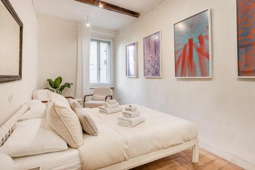 En eller flere senge i et værelse på Leonina Art House