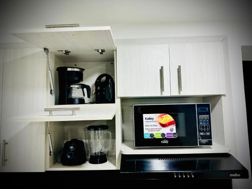 Køkken eller tekøkken på Lindo apartaestudio Bdm luxury