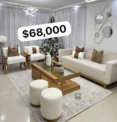 a living room with a couch and a table and chairs at Recidencial in Mendoza
