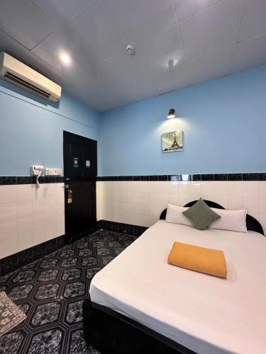 Giường trong phòng chung tại Nam Đô Hotel Cần Thơ Downtown