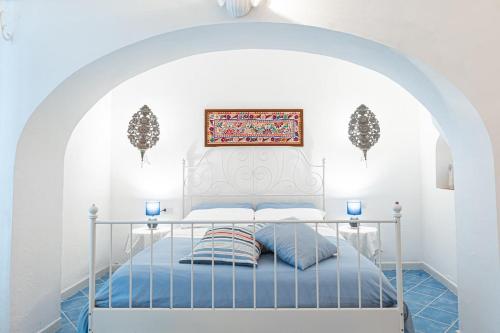 En eller flere senge i et værelse på Villa Svevo Positano