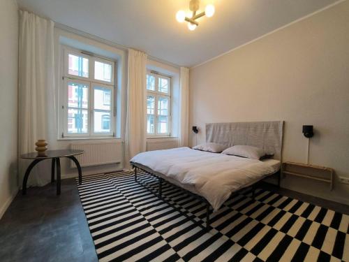 Ένα ή περισσότερα κρεβάτια σε δωμάτιο στο NakedUrban THE ONE