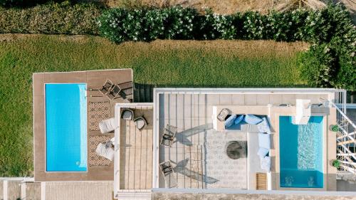 an overhead view of a resort with a pool at CASA DI NONNA ANNY in Porto Heli