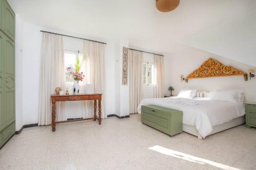 Кровать или кровати в номере Maison ltoile de Sidi Bou Sad - 360 Sea View