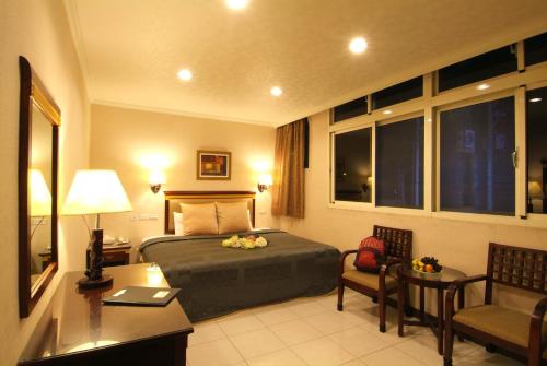 Ruang duduk di Puti Commercial Hotel