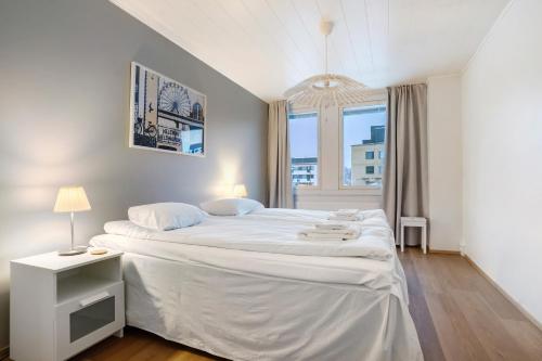 Ένα ή περισσότερα κρεβάτια σε δωμάτιο στο Santalux City Suite, Sauna