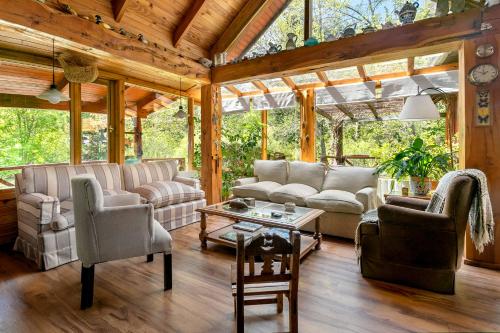 Posezení v ubytování BOG Costa de Rio - Piscina climatizada y costa de rio