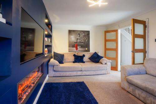 Et opholdsområde på Spacious 4 Bed House - Sleeps 8