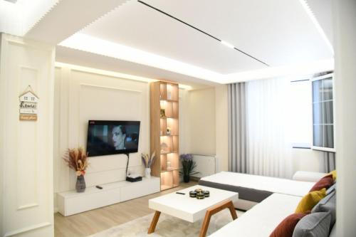 TV/trung tâm giải trí tại Villa Royale