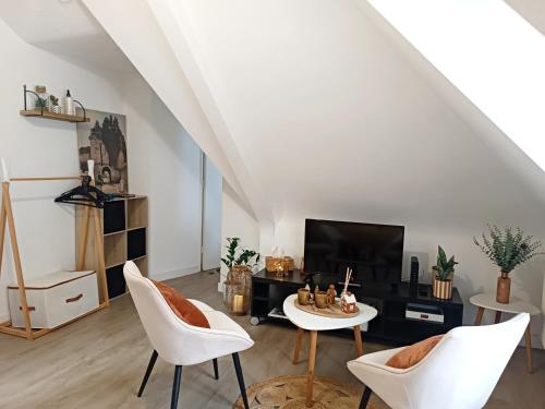 Χώρος καθιστικού στο Charmant T1 au cœur du centre historique de Dinan