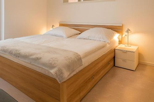 Ένα ή περισσότερα κρεβάτια σε δωμάτιο στο Apartment Warnemünde 15