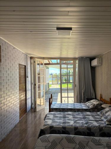 Postel nebo postele na pokoji v ubytování Pousada Aguas do Mampituba