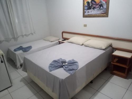 Uma cama ou camas num quarto em Hotel Internacional