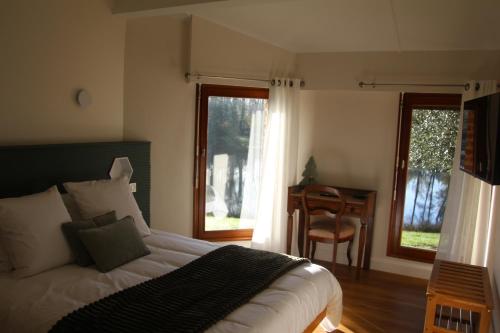 Postel nebo postele na pokoji v ubytování A L'Esquirot