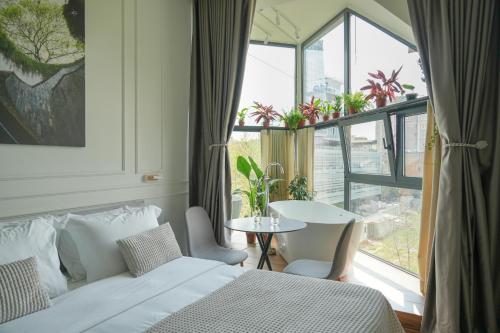 Postel nebo postele na pokoji v ubytování Moonlight Apartments Tirana