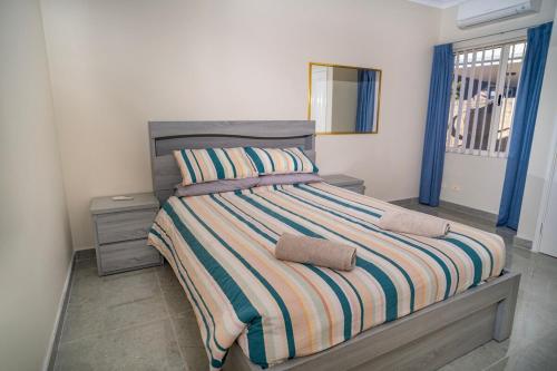 En eller flere senge i et værelse på Luxury Canal Life OASIS