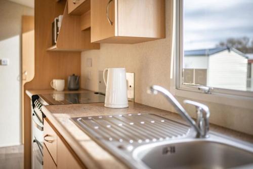 Køkken eller tekøkken på North Wales Coastal Stay
