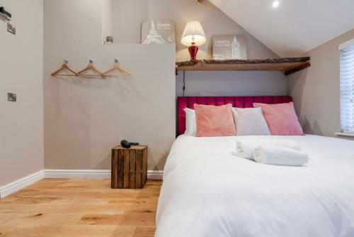 Postel nebo postele na pokoji v ubytování The Malt Loft