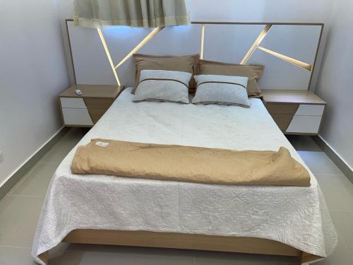 Ένα ή περισσότερα κρεβάτια σε δωμάτιο στο Apartment in the heart of Santiago