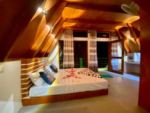 Ένα ή περισσότερα κρεβάτια σε δωμάτιο στο The Sunshine Ella