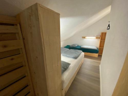 Postel nebo postele na pokoji v ubytování HOSTEL MAMA MIA - Budget