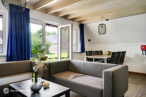 Χώρος καθιστικού στο Familiehuis op een rustig park