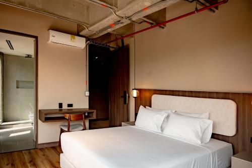 Una cama o camas en una habitación de Uukam by Bernalo Hotels