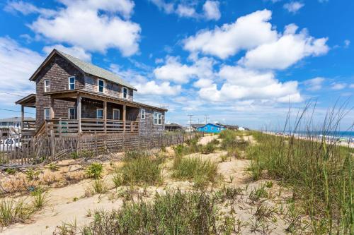 an old house on the beach near the ocean at 4020 - Gardners Hut in Kitty Hawk Beach