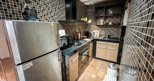 Η κουζίνα ή μικρή κουζίνα στο Au coeur d 'Avignon-Bonneterie