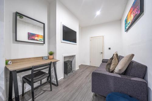 Μια τηλεόραση ή/και κέντρο ψυχαγωγίας στο Central Cardiff townhouse for groups & families