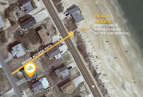 a map of a desert field with a yellow arrow at 4140 - Beach Carousel in Kitty Hawk