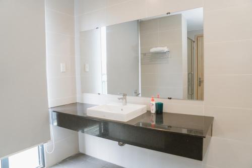 Et badeværelse på Aria Seaside Hotel