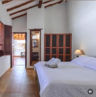 Postel nebo postele na pokoji v ubytování Casa Lucia- Barichara