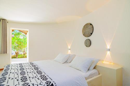 Postel nebo postele na pokoji v ubytování Keur Saloum Resort