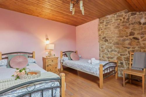 Ένα ή περισσότερα κρεβάτια σε δωμάτιο στο Montegrande, entorno mágico rodeado de montañas