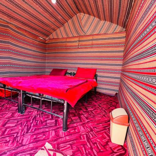 Sunrise Magic Camp tesisinde bir odada yatak veya yataklar