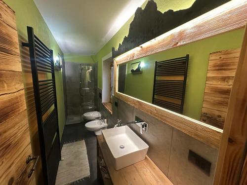 O baie la Appartamento PELMO