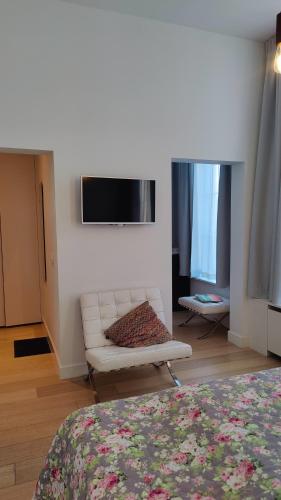 Televizors / izklaižu centrs naktsmītnē b&b les invités