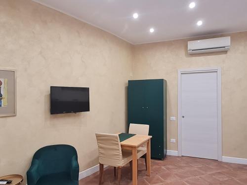 TV a/nebo společenská místnost v ubytování Eden House