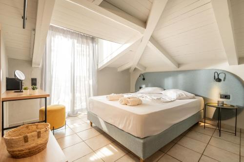 Ένα ή περισσότερα κρεβάτια σε δωμάτιο στο Mavra Elegant Apartments