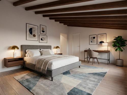 een slaapkamer met een bed, een tafel en een bureau bij Casa Ca'n Bernat in Santanyi