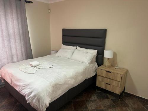 Llit o llits en una habitació de Kamegas