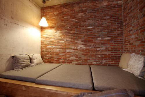 Una cama o camas en una habitación de Boutique Hotel Loft