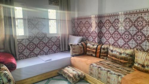 Postel nebo postele na pokoji v ubytování Maison Bab boujloud