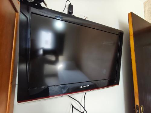 Фотография из галереи Apartamento completo perto da praia do Sesc Bertioga в городе Бертиога