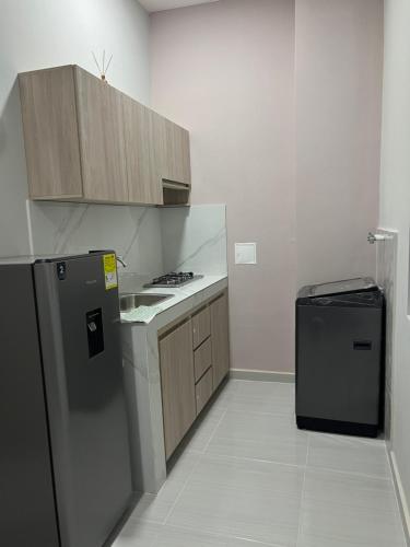 Køkken eller tekøkken på Apartaestudio amoblado Edificio Buenos Aires Sincelejo