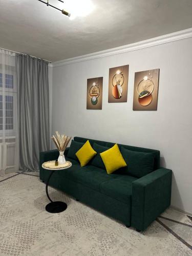 Et opholdsområde på Уютная квартира возле старого базара