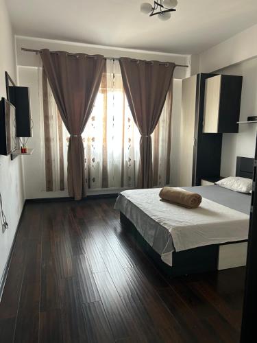 Postel nebo postele na pokoji v ubytování Bella Home Apartment